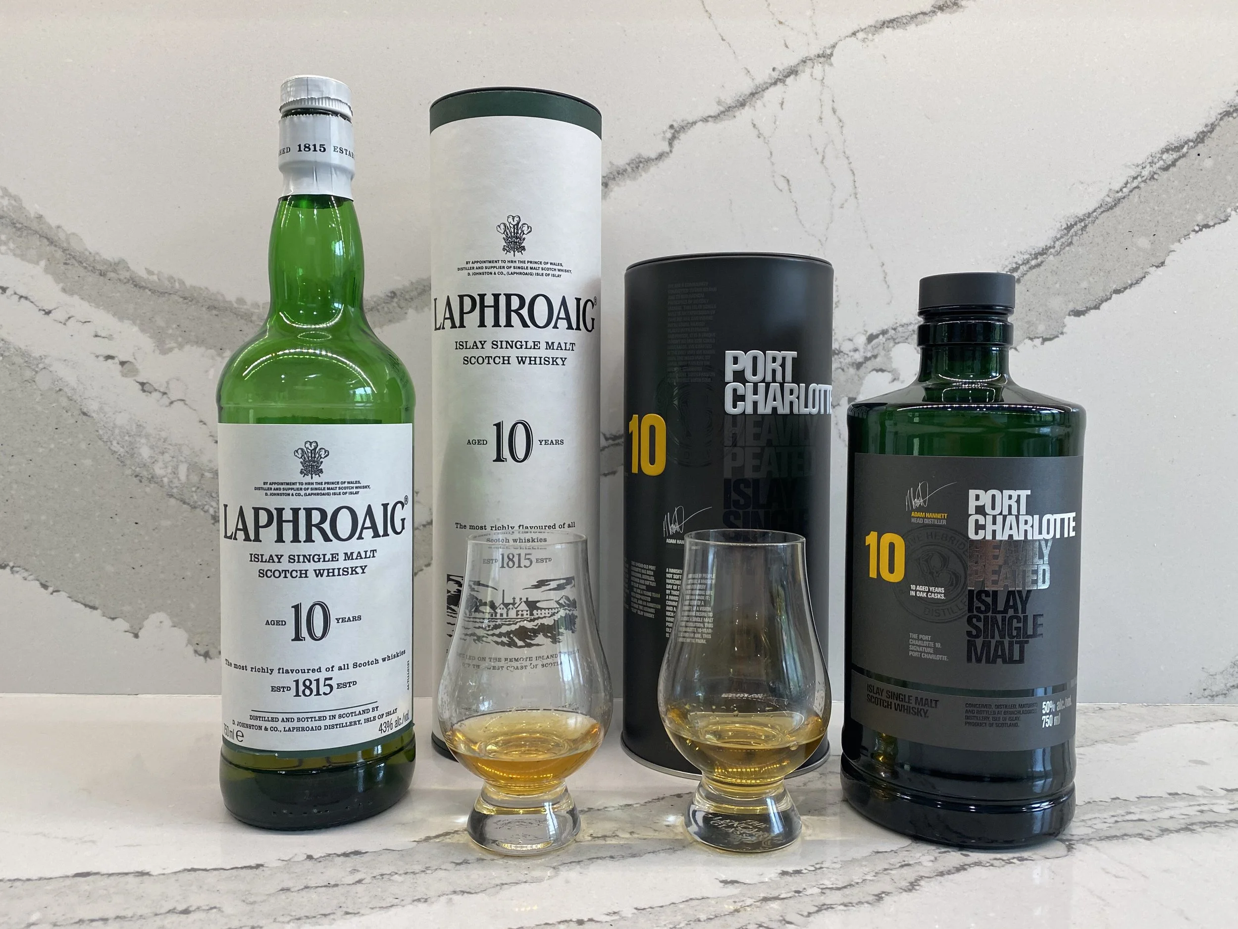 Port Charlotte 10 vs Laphroaig 10 — Dramface Port Charlotte 10 vs Laphroaig 10 — Dramface